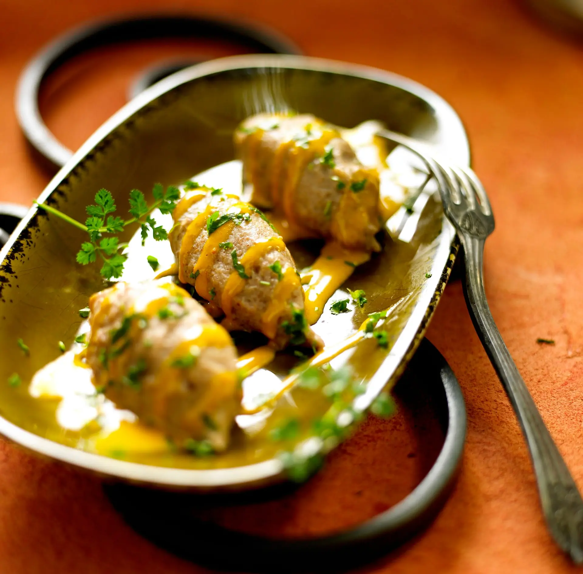 Quenelles de pieds-de-mouton à la crème de mangue